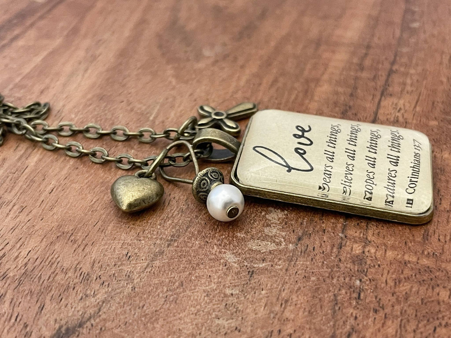 1 Corinthians 13:7 Glass Pendant Necklace