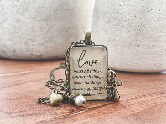 1 Corinthians 13:7 Glass Pendant Necklace